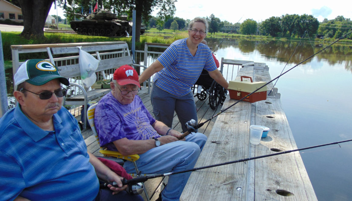 Rolling Hills volunteer and residents fishing