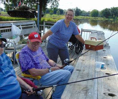 Rolling Hills volunteer and residents fishing